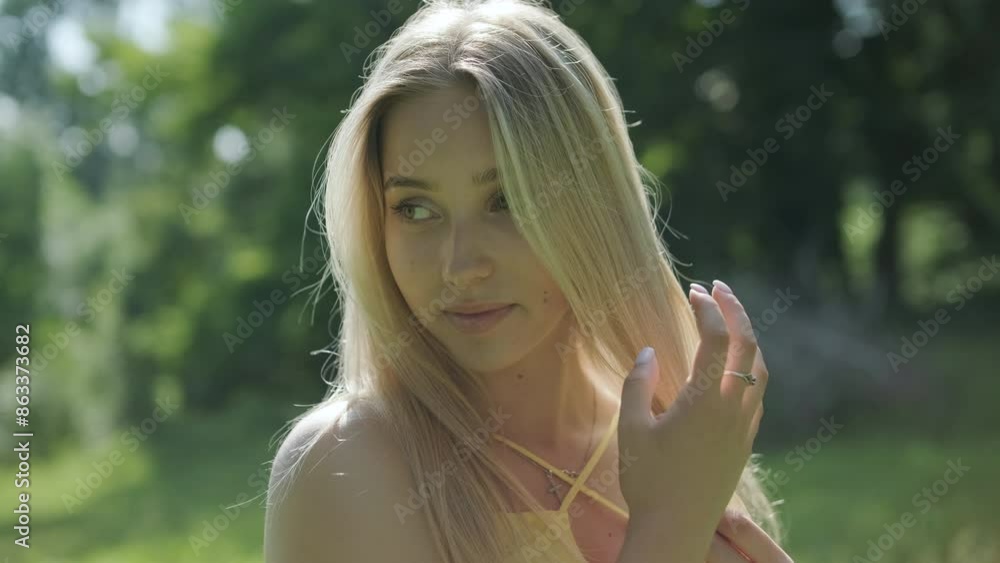 Woman in Yellow Dress Dancing Gracefully in Summer Park Woman in Yellow Dress Dancing Gracefully in Summer Park