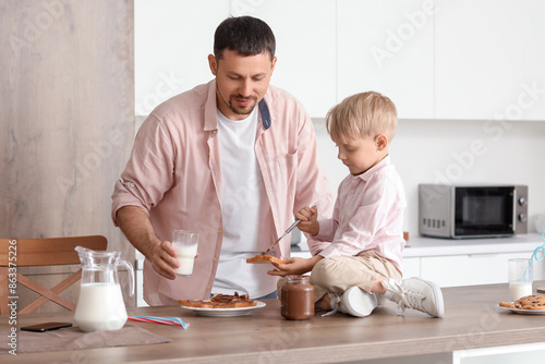 Little boy with his father ...
