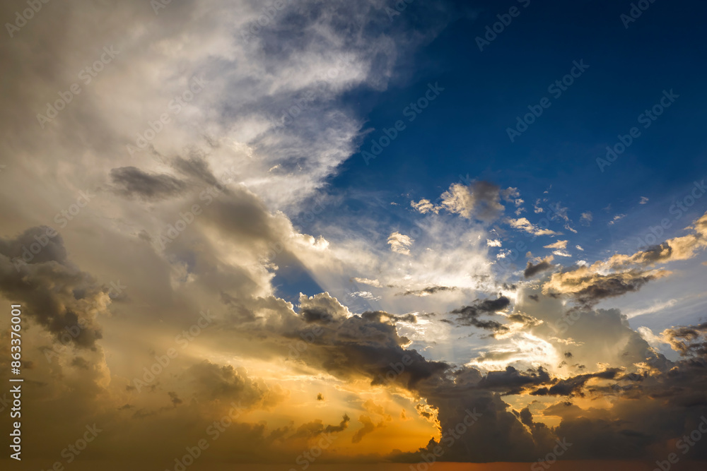 Amazing evening skyscape. Sunset sky with bright colorful clouds Amazing evening skyscape. Sunset sky with bright colorful clouds