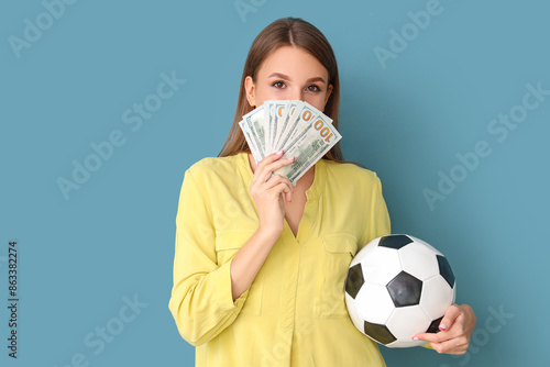 Young woman with soccer bal...