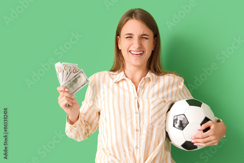 Young woman with soccer bal...