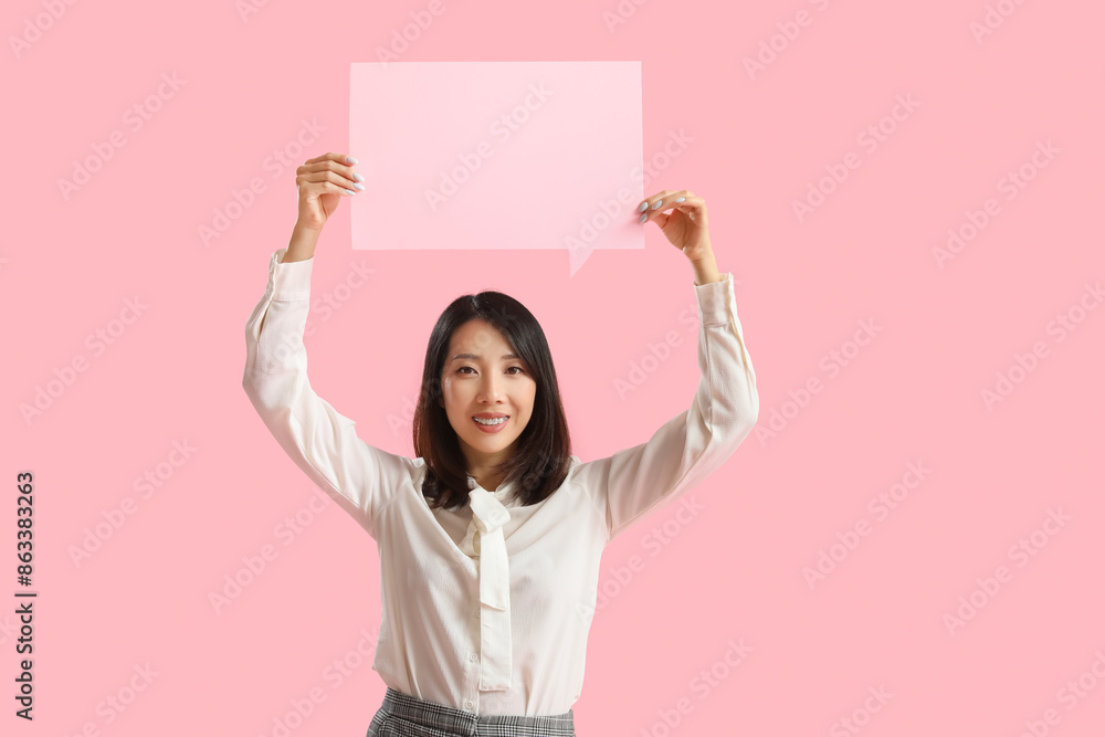 Beautiful Asian woman with blank speech bubble on pink background Beautiful Asian woman with blank speech bubble on pink background