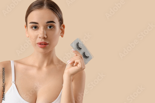 Young woman with false eyel...