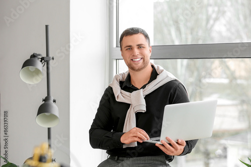 Young businessman working w...