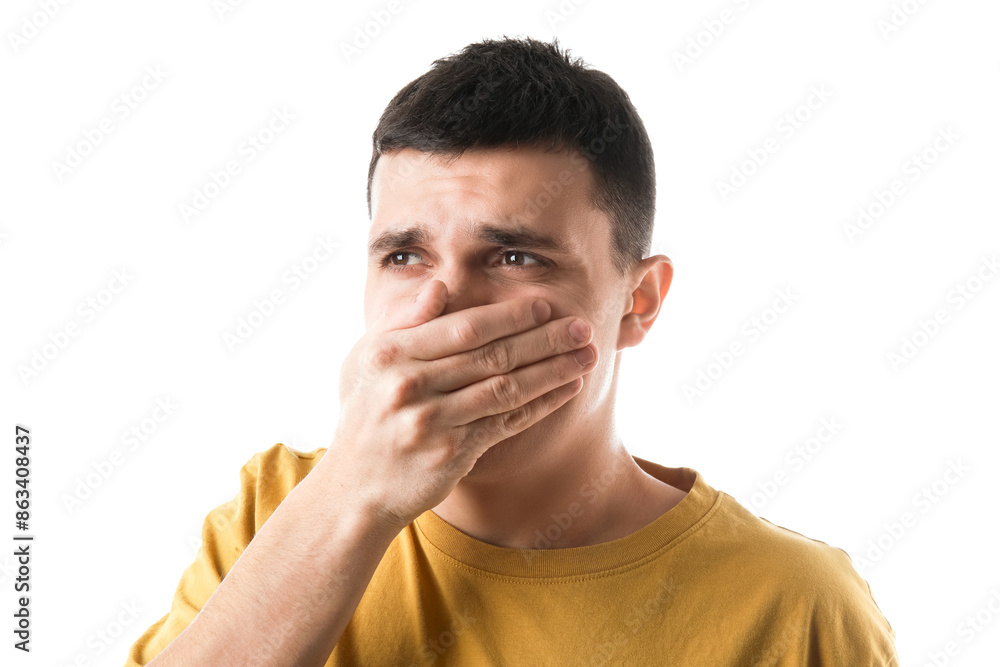 Handsome young man feeling bad smell on white background Handsome young man feeling bad smell on white background