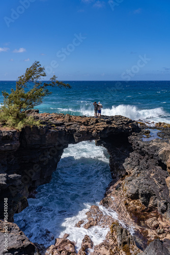 Lava rock Sea Arch, Makahuena Light, Koloa, Kauai South Shore，Hawaii. Koloa Volcanics	
 photo