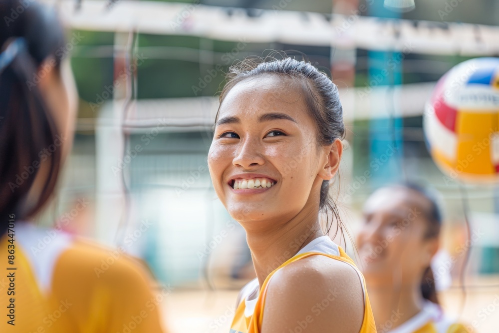 Thai high school female volleyball athletes gather for practice and training sessions on the indoor sports court, honing their skills and teamwork in preparation for upcoming matches. Thai high school female volleyball athletes gather for practice and training sessions on the indoor sports court, honing their skills and teamwork in preparation for upcoming matches.