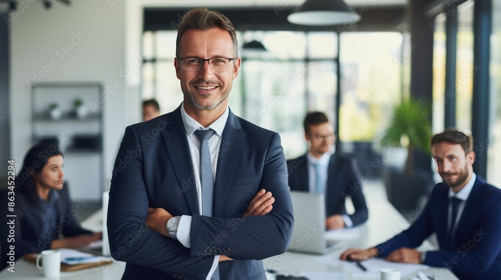 Confident businessman leaning on his desk with arms crossed, Confident businessman leaning on his desk with arms crossed,