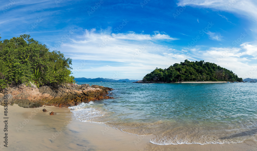 Tropical Paradise Beach with Lush Green Island and Blue Sky Tropical Paradise Beach with Lush Green Island and Blue Sky