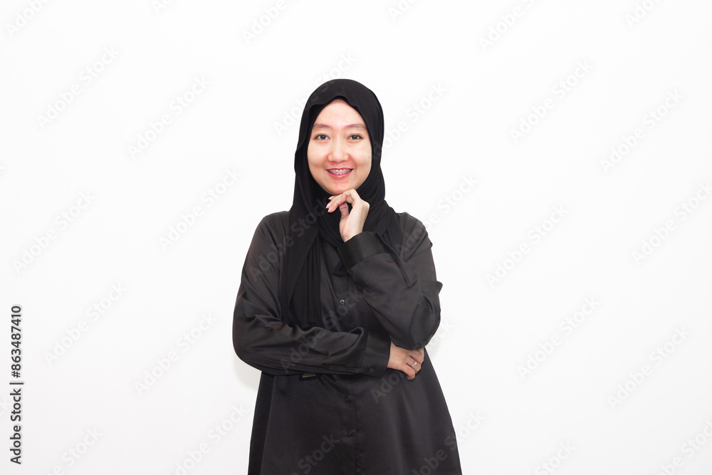 Beautiful and cheerful young Asian Muslim woman, with various expressions. isolated on white background Beautiful and cheerful young Asian Muslim woman, with various expressions. isolated on white background