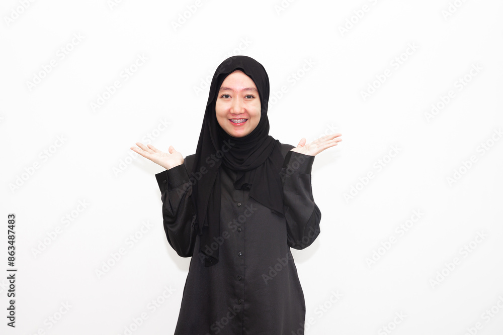 Beautiful and cheerful young Asian Muslim woman, with various expressions. isolated on white background Beautiful and cheerful young Asian Muslim woman, with various expressions. isolated on white background