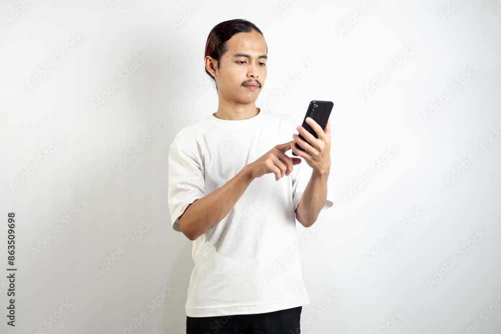 Asian man with various expressions while holding mobile phone. isolated in white background Asian man with various expressions while holding mobile phone. isolated in white background