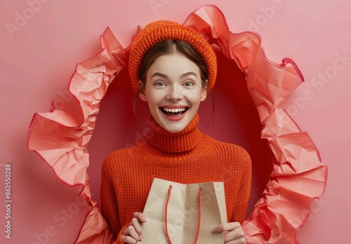 Happy Woman Holding Shopping Bag In Pink Studio
