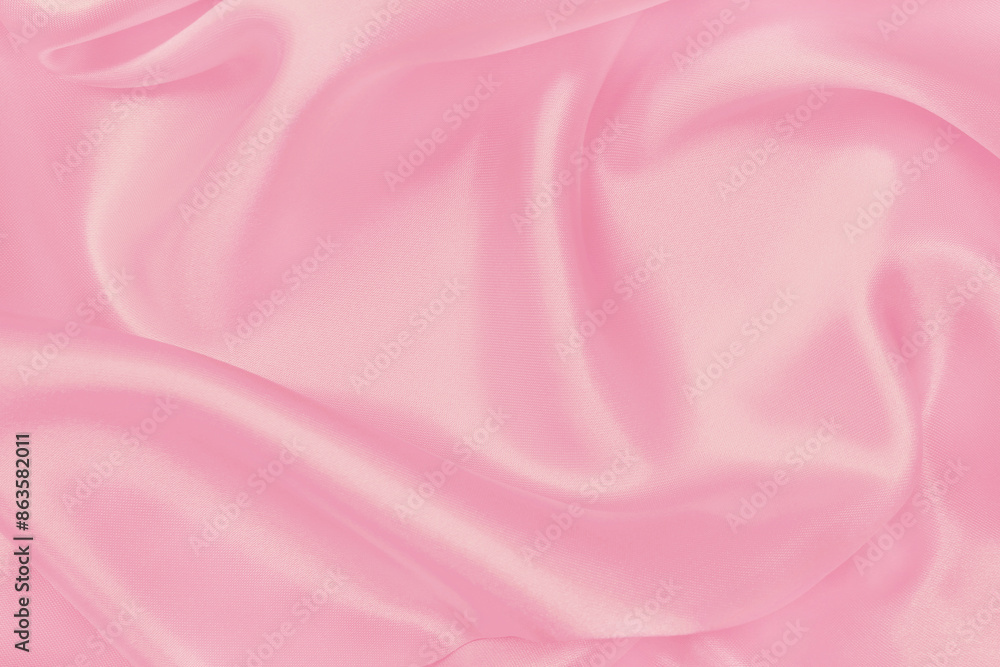Obraz premium Soft pink fabric texture background, detail of silk or linen pattern.