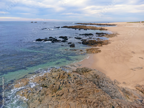 Obraz na płótnie aerial drone view of a beach with a rock, zenithal photo, Portugal w salonie