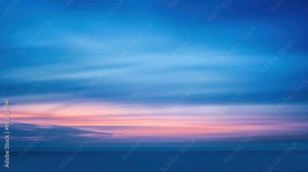 Obraz premium An abstract image of a sky at twilight with a gradient of blue shades blending into dusk