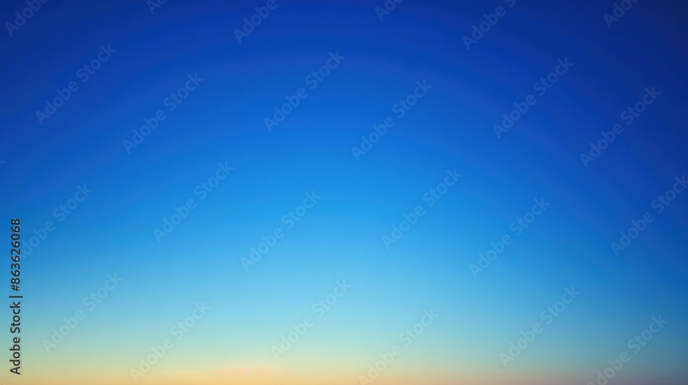 Obraz premium An abstract image of a sky at twilight with a gradient of blue shades blending into dusk