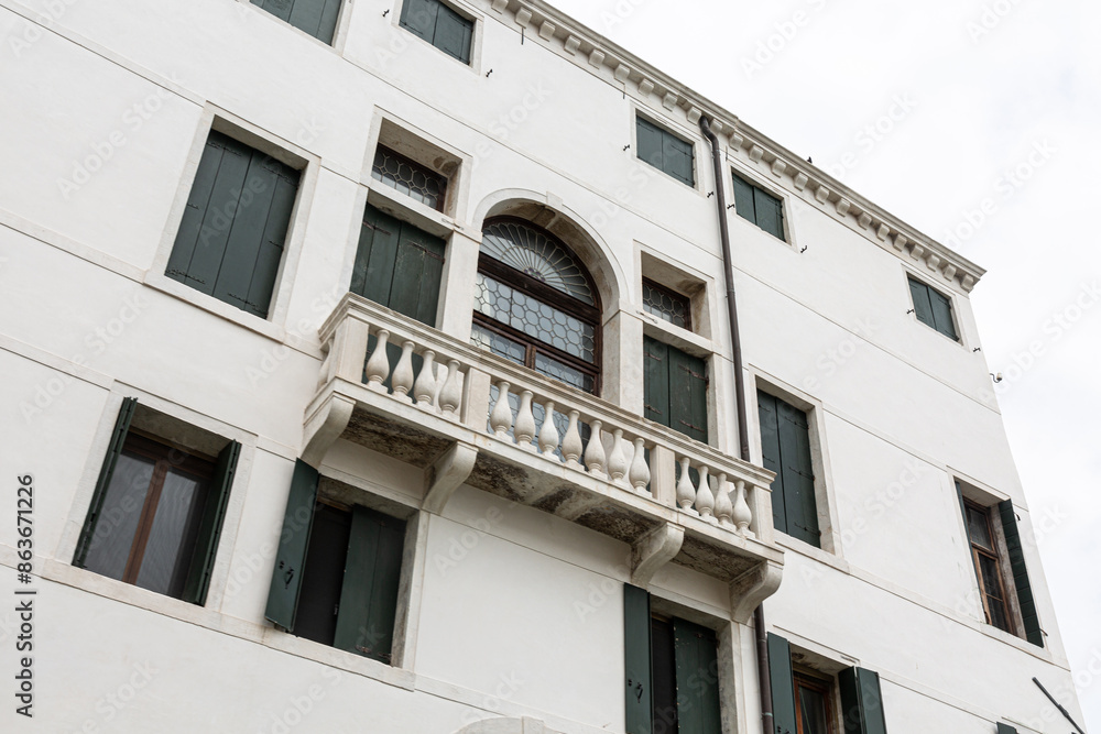 Obraz premium View to typical house in Venice with windows with shutters