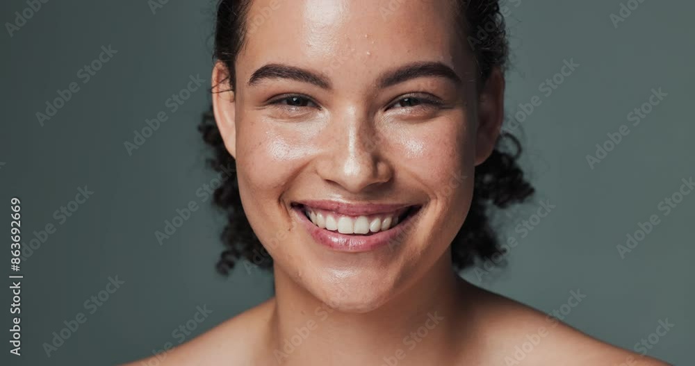 Woman, face and beauty or skincare in studio, smile and acne treatment for dermatology wellness. Glowing, clean and routine transformation, background and confident for natural breakout prevention Woman, face and beauty or skincare in studio, smile and acne treatment for dermatology wellness. Glowing, clean and routine transformation, background and confident for natural breakout prevention