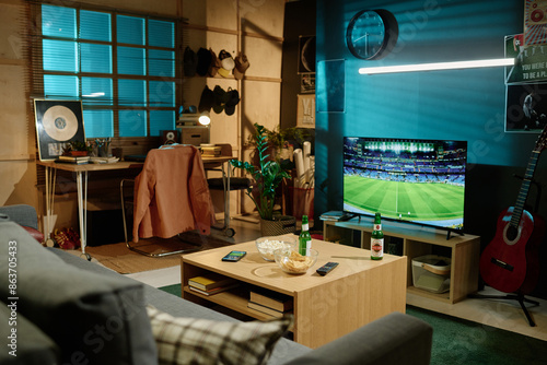 Bild auf Leinwand No people wide shot of modern living room interior with beer and snacks on table