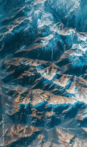 A close-up satellite photograph capturing the rugged peaks and valleys of a mountain range photo