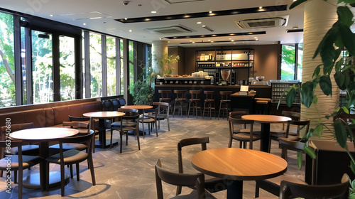 Discover the inviting interior of a multi-purpose event space and café, featuring modern design, cozy seating, and ambient lighting perfect for gatherings, meetings, and casual hangouts. © Kavidu