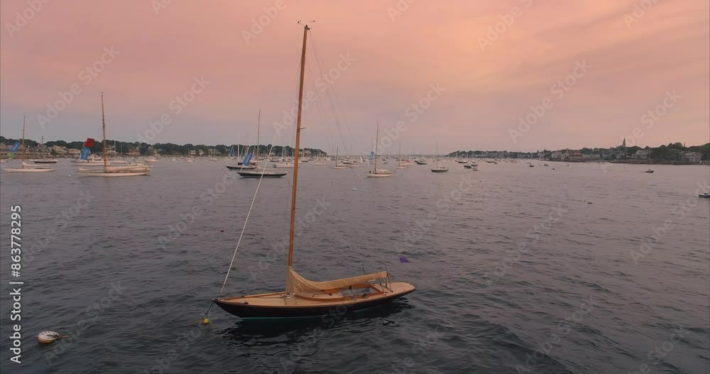 Small Yachts docked in the Marblehead Harbour at sunset, Marblehead, Massachusetts, United States Of America. Small Yachts docked in the Marblehead Harbour at sunset, Marblehead, Massachusetts, United States Of America.