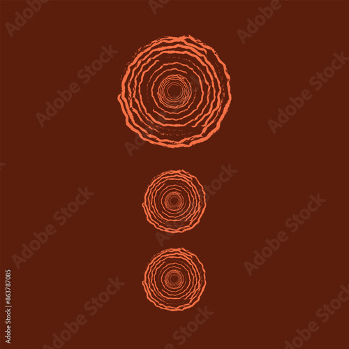 Three circles are shown on a brown background. The circles are all different sizes and are arranged in a row. The circles are orange and appear to be made of wood