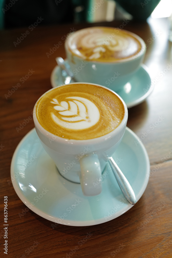 Close up ceramic cup of hot Latte art coffee Close up ceramic cup of hot Latte art coffee