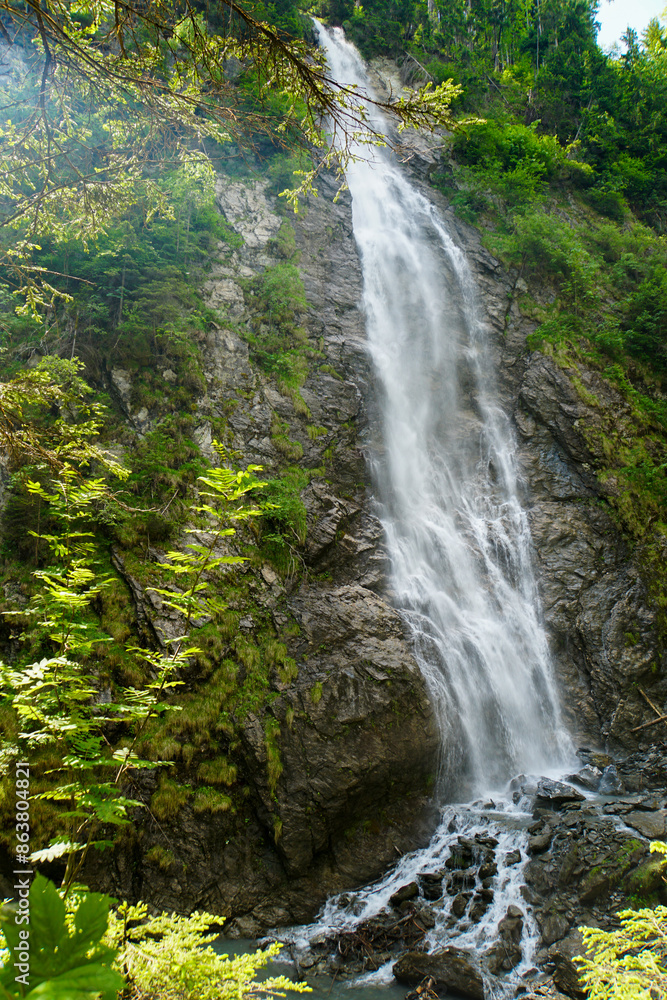 Waterfall cascade in a gorge with rocks. Kitzlochklamm in Austria. Waterfall cascade in a gorge with rocks. Kitzlochklamm in Austria.
