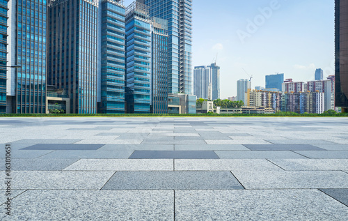 Photography Empty square facing modern business buildings in big city