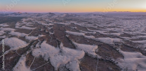 Texture of giant sand dunes and mountain range at sunset at the Little Sahara Recreation Area, Nephi, Utah, United States of America. photo