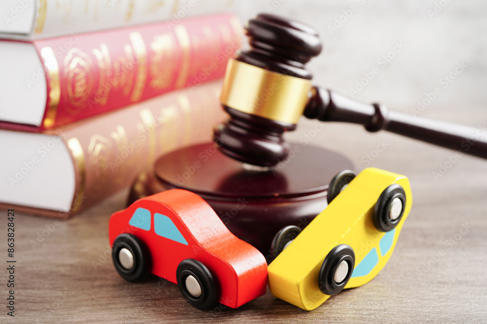 Fototapeta premium Car accident lawsuit and insurance, Judge hammer with car model.