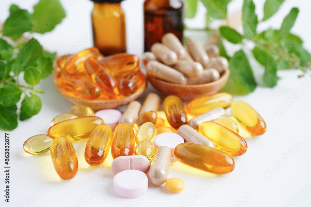 Alternative medicine herbal organic capsule with vitamin E omega 3 fish oil, mineral, drug with herbs leaf natural supplements for healthy good life. Alternative medicine herbal organic capsule with vitamin E omega 3 fish oil, mineral, drug with herbs leaf natural supplements for healthy good life.