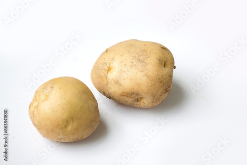 White background with brown potato.