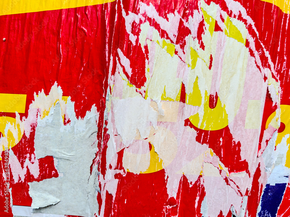 Old grunge ripped, torn vintage posters creased crumpled paper surface texture background