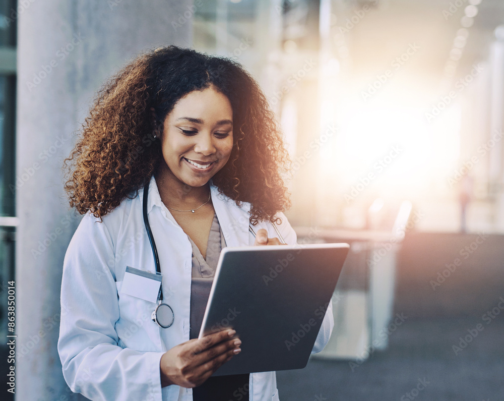 Doctor, happy and tablet with woman in hospital for diagnosis, reading medical records or research. Healthcare, technology and smile with expert medicine professional in clinic for info or insurance Doctor, happy and tablet with woman in hospital for diagnosis, reading medical records or research. Healthcare, technology and smile with expert medicine professional in clinic for info or insurance