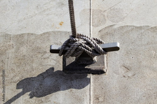 Halyard Belayed To Metal Cleat On Ferry Boat