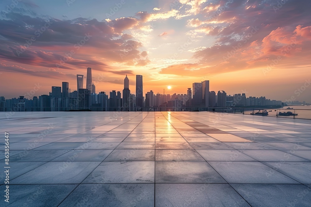 Empty square floors and city skyline with modern buildings at sunset high angle view Empty square floors and city skyline with modern buildings at sunset high angle view
