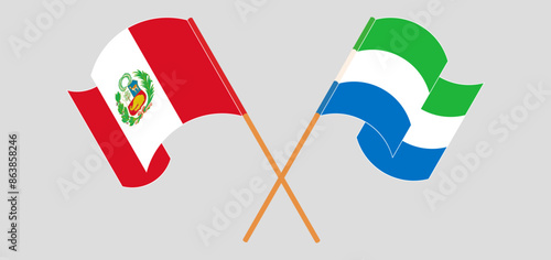 Crossed and waving flags of Peru and Sierra Leone