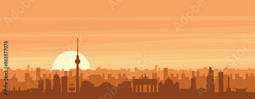 Brown panoramic poster of the city skyline with misty background buildings, sunrise, clouds and mountains of BERLIN, GERMANY