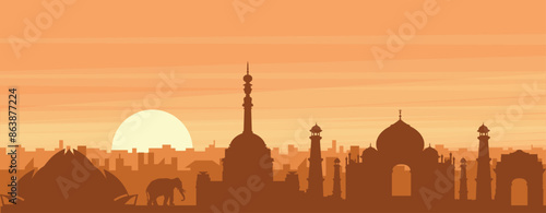 Brown panoramic poster of the city skyline with misty background buildings, sunrise, clouds and mountains of NEW DELHI, INDIA