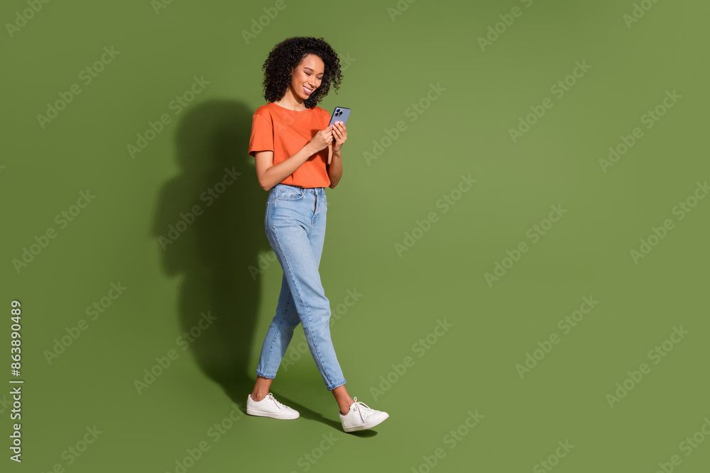 Photo of positive carefree lovely senior woman wear trendy pajama look empty space isolated on blue color background Photo of positive carefree lovely senior woman wear trendy pajama look empty space isolated on blue color background