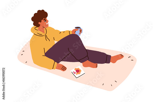 Man enjoying tea and biscuits. Happy guy relaxing with sweet cookies and coff...