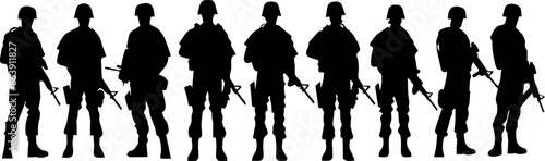 A group of soldiers stand in a line, all wearing the same uniform