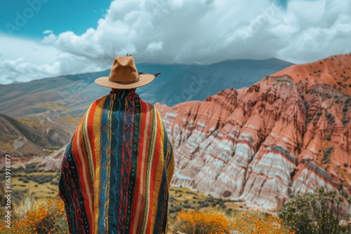 Obraz na płótnie Indigenous Man in Traditional Clothing Standing in Quebrada de Humahuaca
w salonie