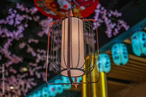 The lamp shades cast a golden light, turning the restaurant into a sanctuary of taste and comfort, Sushi Kingdom, Dunwoody, Georgia, United States of America photo