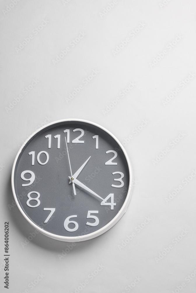 Large round wall clock on a gray background Large round wall clock on a gray background