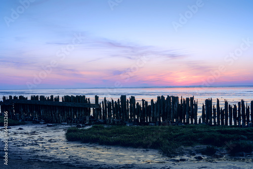 Dutch Mud Flats at sunset with Panoramic view over the tidal flats along the shore of the netherlands