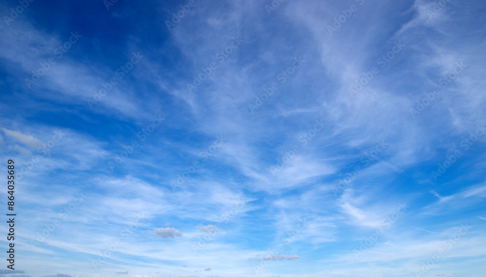 White fluffy clouds in the sky. White fluffy clouds in the sky.